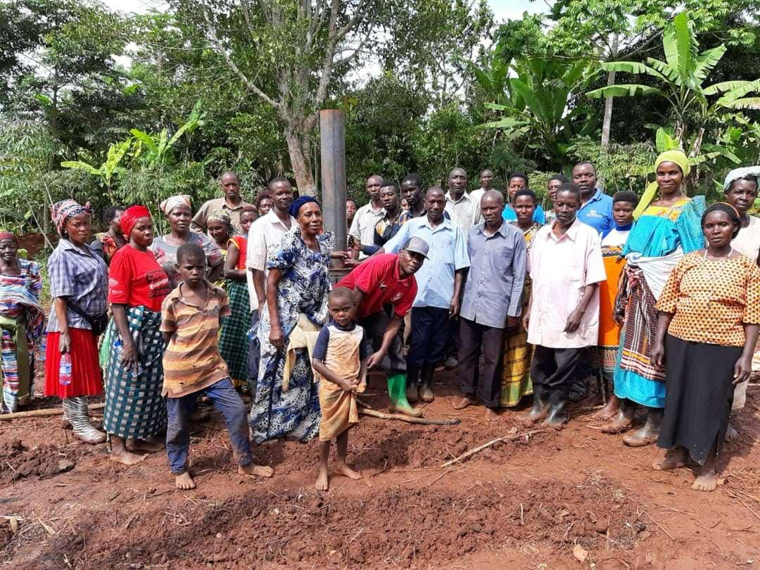 Farmers and community members at the World Vision Uganda on-farm demonstration